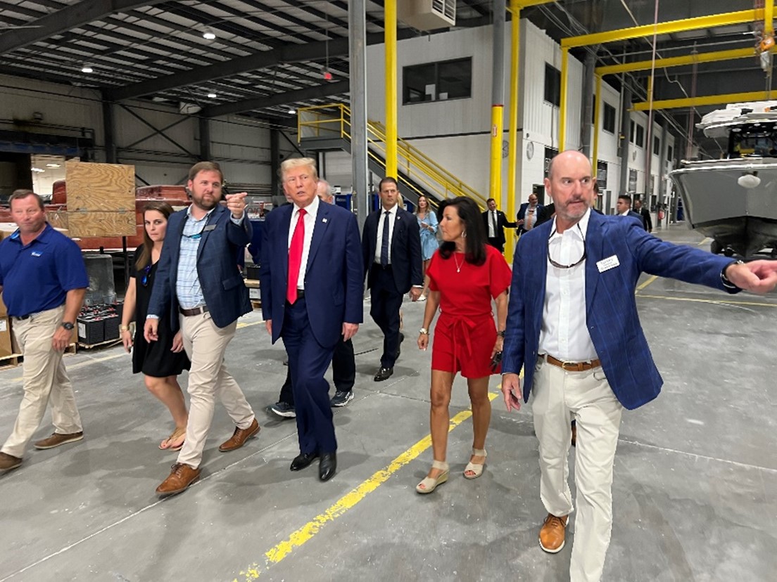 Former President Donald Trump tours the Sportsman Boats facility in South Carolina.