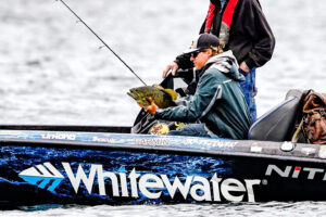 Jay Przekurat holds a smallmouth bass