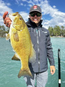 Jay Przekurat holds a smallmouth bass